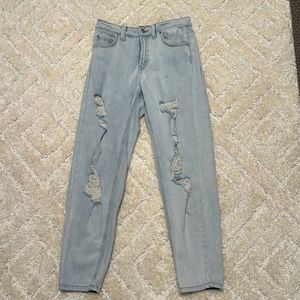 light wash size 00 wildfable jeans with rips